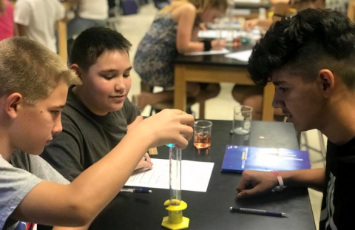  students doing a science experiment