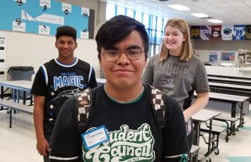  A student council student smilies