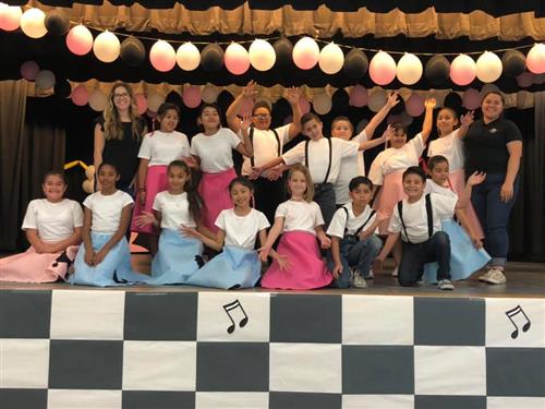 students dressed as characters from the 1950s