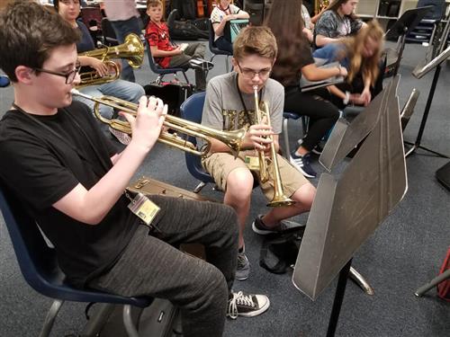 students playing the trumpet