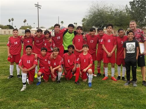 boys soccer team in red uniforms