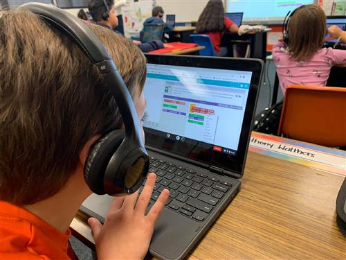 student using laptop