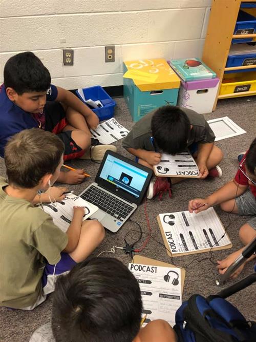 students working on laptops
