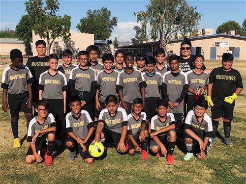 students in soccer jerseys