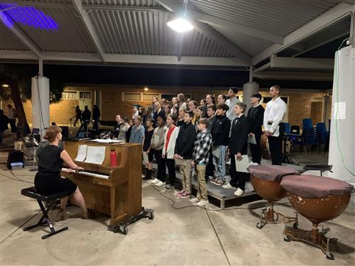 students sing in choir class