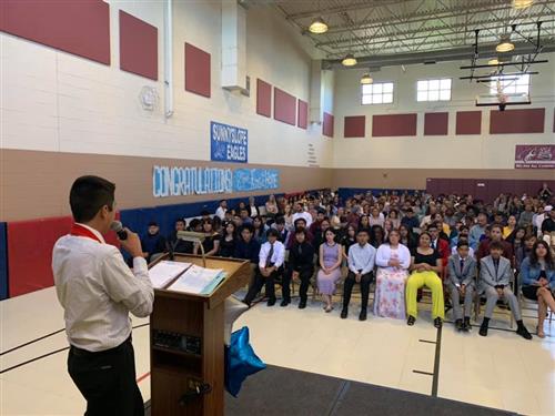 a student addresses his peers