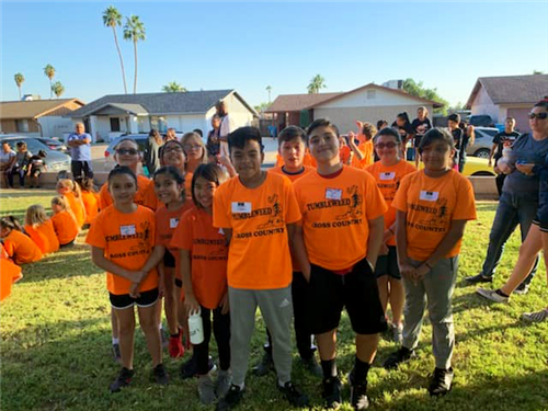 the cross country team wears orange