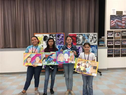 students with their art